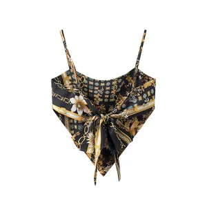Detailed view of the irregular floral bandana halter top with a front bow tie design.