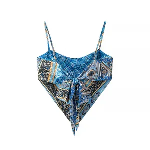 Detail of bohemian paisley print camisole with tie-front bow and spaghetti straps