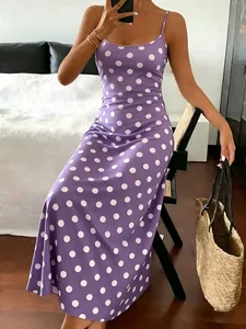 Elegant purple polka dot print maxi dress with slim fit and spaghetti straps detail
