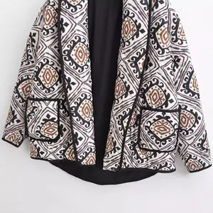 Bohemian geometric print quilted cotton jacket for women with contrast black piping trim
