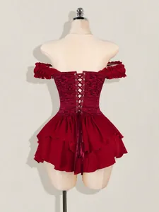 Back view of red off-shoulder mini dress with jacquard corset and tiered ruffled hem