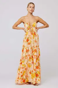 Elegant bohemian floral print tiered maxi dress featuring a cutout tie-front detail