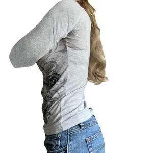 Slim fit grey long sleeve cotton T-shirt with side rose print for women, side view
