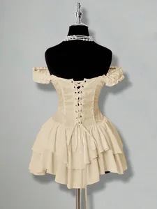 Detailed back view of cream jacquard off-shoulder ruffled chiffon mini dress with lacing