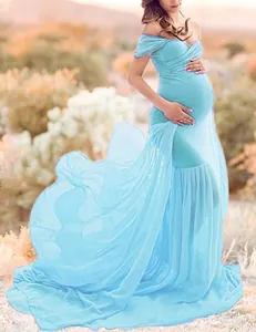 Elegant sky blue mercerized cotton and chiffon maternity dress with a long tail.