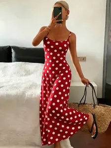 Elegant red sleeveless maxi dress featuring a classic white polka dot print for summer