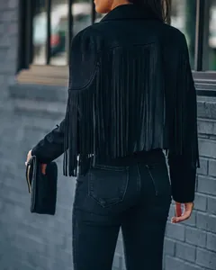 Close-up back view of a chic black suede fringe jacket with long tassels for women's autumn wear.