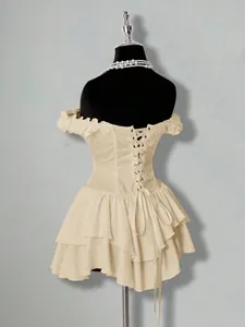 Back view of cream jacquard off-shoulder ruffled layered chiffon mini dress with lace-up