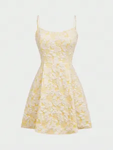 Detail showing the intricate floral texture of this yellow square-neck sleeveless dress