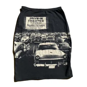 Elegant black knitted midi pencil skirt featuring a vintage drive-in theater graphic print