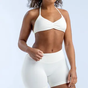 Premium white seamless high-stretch halter yoga sports bra and fitness shorts set