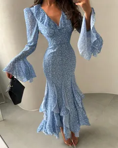 Elegant blue floral maxi dress featuring ruffled bell sleeves and a mermaid hem detail
