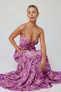 Detailed view of bohemian floral print maxi dress with tie-front and cutout accents