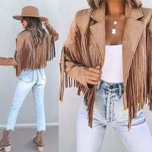 Detailed view of women's tan suede fringe jacket in bohemian western style