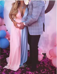 Detailed view of v-neck lace maternity dress for gender reveal photography