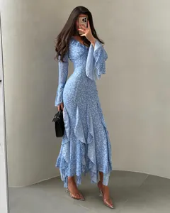 Elegant blue floral maxi dress with trumpet sleeves and ruffled hem for 2026 summer fashion