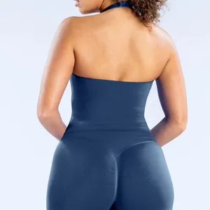 Back view of seamless navy blue halter yoga top showing tight fit design