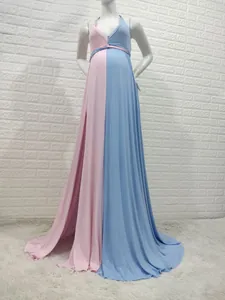 Detailed view of pink and blue split color maternity maxi dress with lace V-neck
