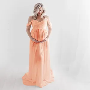 Elegant peach off-shoulder maternity photography dress with front split and floor length