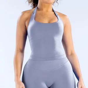 Close-up of seamless halter neck yoga tank top with built-in pads in light blue.