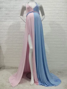 Detail of two-tone pink and blue maternity maxi dress with V-neck, sleeveless and split hem