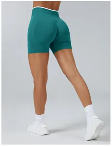 Close-up detail of seamless high-waist yoga shorts with a peach butt-lift design