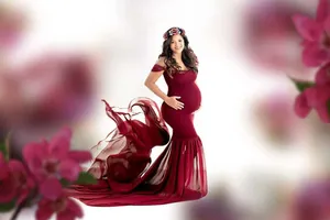 Wine red off-the-shoulder maternity photography dress with flowing chiffon train