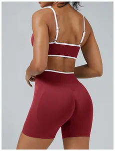 Detailed view of the burgundy backless sports bra and matching high-waist yoga shorts set