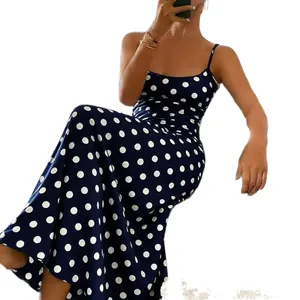 Elegant navy blue spaghetti strap maxi dress with white polka dot print for summer