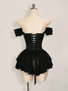 Back view of black ruffle mini dress with jacquard corset detailing on a mannequin