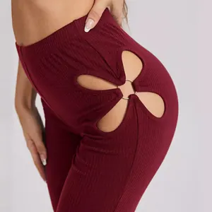 Burgundy high waist rib-knit flared pants with sexy heart cutout and metal ring detail