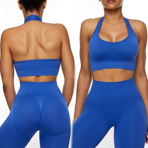 Blue seamless halter yoga set with high waist leggings and peach hip contour design.