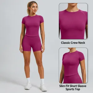 Slim-fit quick-dry women's yoga set featuring short sleeve top and athletic shorts