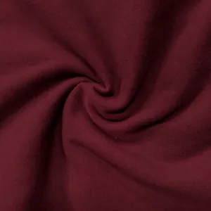 Texture macro du tissu de yoga bordeaux, mélange 93% polyamide et 7% élasthanne