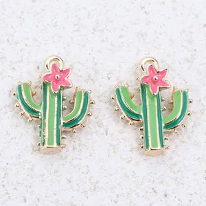 Detailed view of green enamel cactus charms with pink flowers for DIY jewelry making