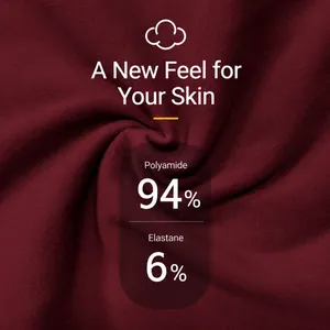 Close-up texture of maroon seamless high-waist yoga pants showing premium fabric detail