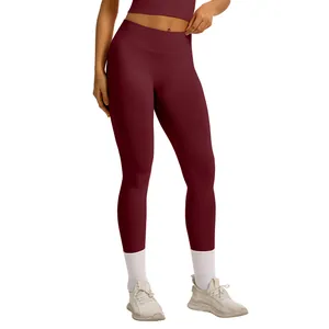 Burgundy high-waisted seamless yoga leggings with peach butt lifting design for fitness