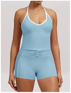 Blue and white halter yoga set featuring cross-waist shorts for women's fitness training