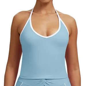 Light blue halter yoga tank top with white contrast piping for fitness and running.