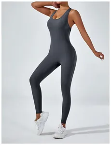 Sleek dark grey one-piece yoga jumpsuit with a bodycon fit for fitness and yoga.