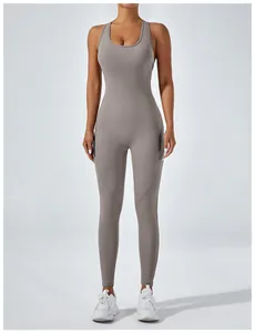 Professional detailed view of high-elasticity one-piece yoga jumpsuit in taupe grey color