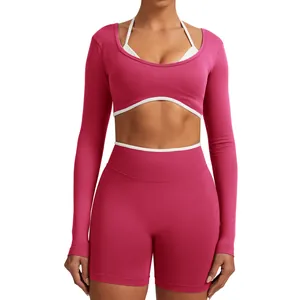 Seamless high-elastic yoga set with long sleeve crop top and matching fitness shorts