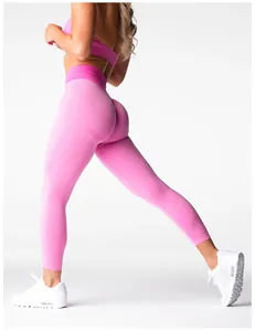 Close-up of pink seamless peach butt yoga leggings with high waist design for fitness