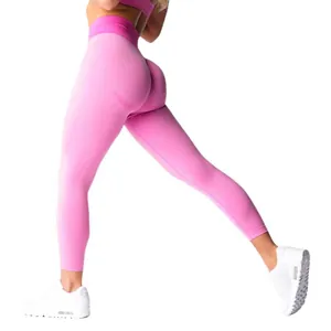 Pink seamless high-waist yoga pants with peach butt lift design for sport fitness