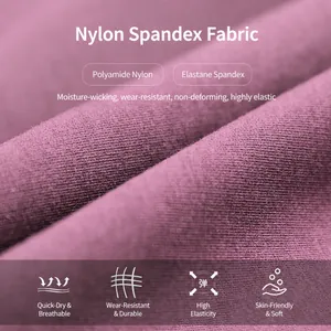 Primo piano del tessuto rosa in poliammide ed elastan per pantaloni yoga traspiranti.