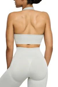 Detail of light grey seamless yoga set showing halter top and high-waisted leggings back