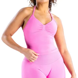Levendige roze naadloze halter yoga set met hoge taille compressie leggings voor fitness