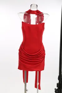 Sexy red strapless bodycon mini dress with elegant draped skirt details for evening