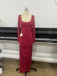 Close-up of red bodycon maxi dress featuring sexy side cutout and ruched detailing