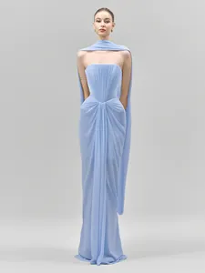Full-length view of an elegant light blue strapless evening gown with pleated details.